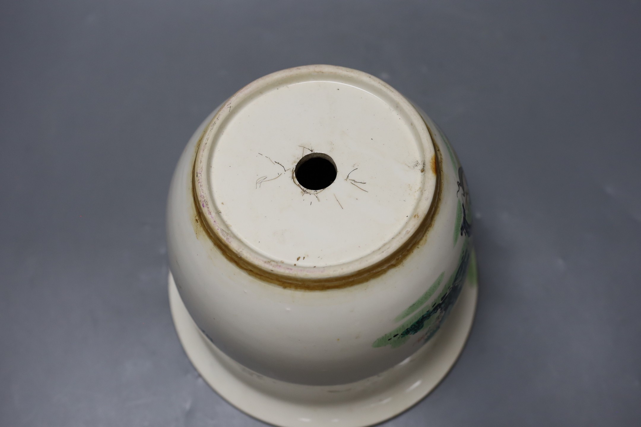 A Chinese famille rose flower pot, with inscription and figural decoration. 17cm tall